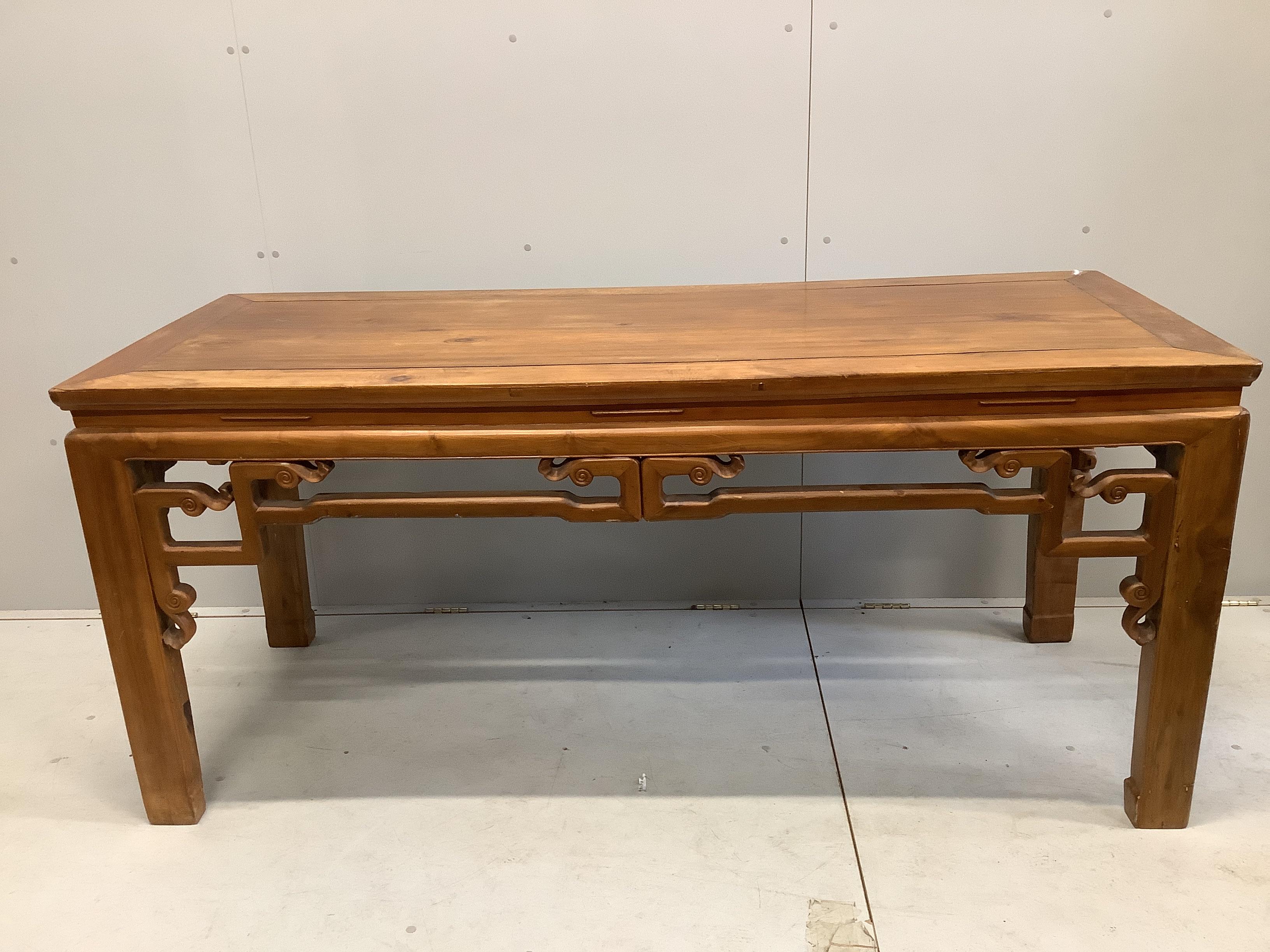 A Chinese carved hardwood altar or serving table, width 184cm, depth 75cm, height 83cm. Condition - good